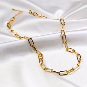 Minimalist 18K gold plated stainless steel paperclip chain necklace on white silk background