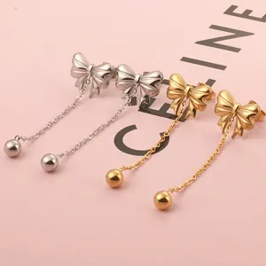 Elegante Schleifen-Ohrringe mit Quasten in Gold und Silber und minimalistischem Tropfen