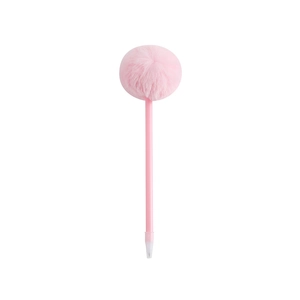 Close-up of pink fluffy pom-pom detail on top of a creative cartoon ballpoint pen