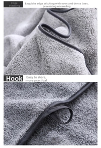 Detail of grey bamboo charcoal fiber bath towel with reinforced edging and hanging hook