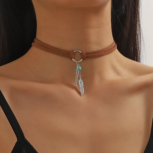 Bohemian choker with brown suede cord, silver feather pendants and turquoise beads