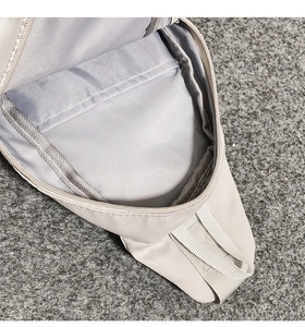 Top-down macro view of the spacious inner main compartment and durable fabric lining