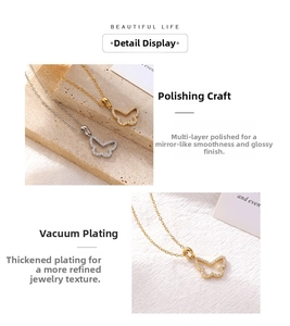 Detailed view of gold and silver butterfly pendants with micro-set zircon stones
