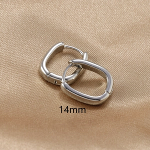 Minimalist silver U-shaped rectangle hoop earrings 14mm on champagne silk background