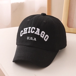 Close-up of Chicago USA white embroidery on breathable black cotton baseball cap