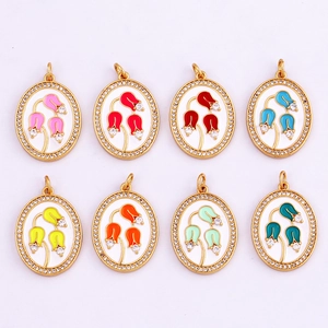 Golden oval flower pendants with colorful enamel lily of the valley and rhinestones