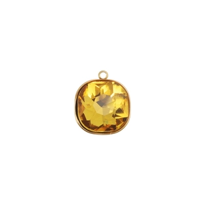 Détail d'un pendentif carré avec pierre de naissance jaune et cadre doré en acier inoxydable