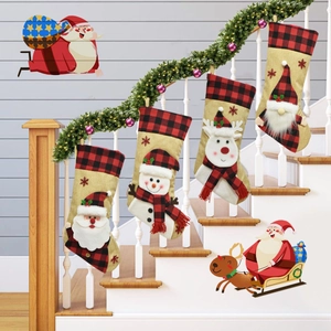 Detailed set of 4 3D plush Christmas stockings with plaid patterns on a festive staircase