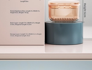 Detailed view of amber transparent dental box with dimensions of 8x8x6cm and drainage tray