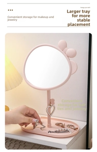 Pink bow makeup mirror with rotating desktop stand and jewelry organizer base tray