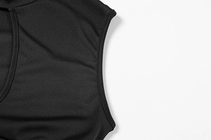 Detail shot of black sleeveless dress stitching with high-quality edge seam finish