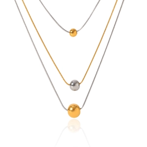 Layered gold and silver stainless steel snake bone necklaces with round bead pendants