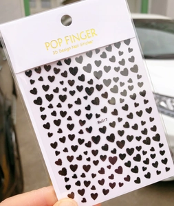 Detail of 3D black heart nail stickers Me017 with POP FINGER brand packaging
