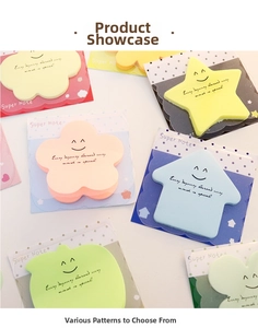 Detailed view of colorful flower, star, and cloud shaped sticky notes with motivational quotes