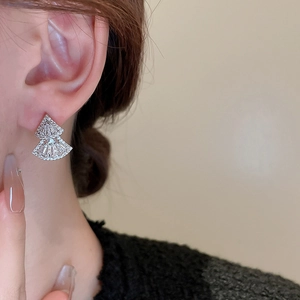 Elegant silver fan-shaped geometric stud earrings with sparkling cubic zirconia stones