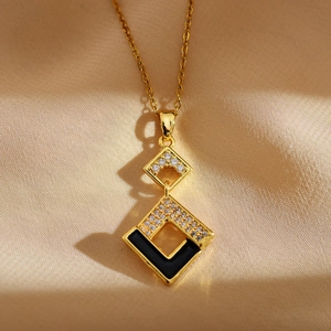 Luxurious geometric rhombus necklace in gold plating with black enamel and zircon inlay