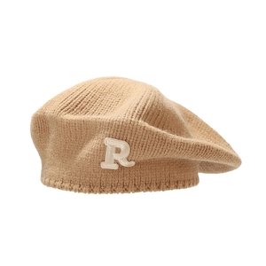 Chic camel knitted beret with embroidered letter R in a vintage French painter style