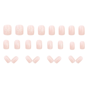 Short square soft pink press-on nails set with elegant white bow ribbon designs
