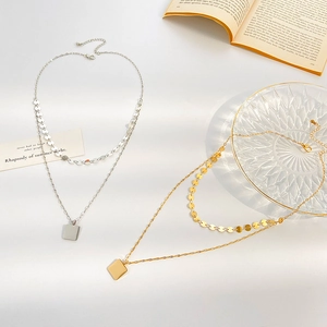 Double-layered gold and silver necklaces with square pendant and bohemian metal discs