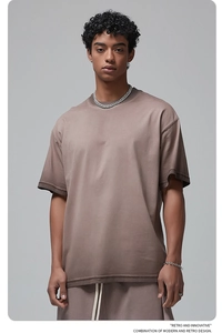 Detail of taupe oversized summer set showing heavy cotton fabric and drop shoulder design