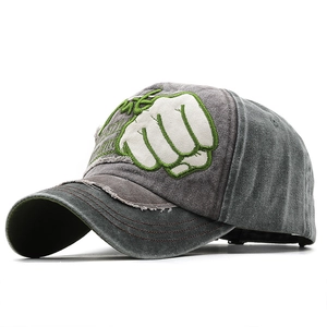 Distressed charcoal grey washed cotton baseball cap with embroidered fist and raw edges