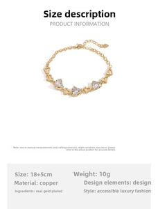 Detailed view of copper gold plated bracelet with three heart-shaped zircon stones