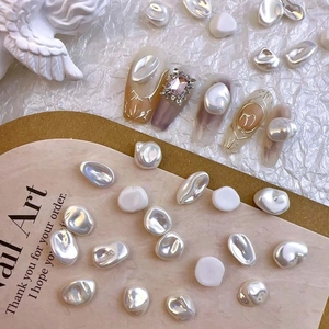 Baroque irregular nail art pearls in metallic and matte white finish on decorative card