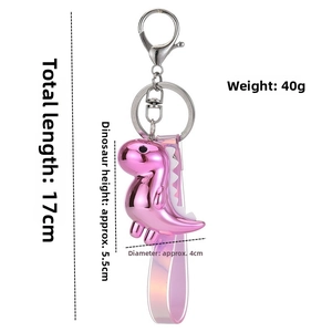 Pink metallic dinosaur keychain with holographic strap and Lobster clasp details
