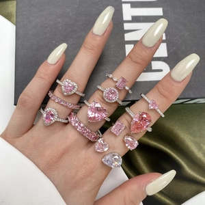 Elegant set of 925 sterling silver rings with pink zirconia in heart and pear cuts