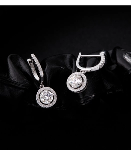 Detailed close-up of S925 sterling silver moissanite halo leverback earrings