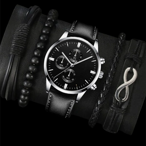 Detail view of black dial leather watch and braided beaded bracelets with infinity charm