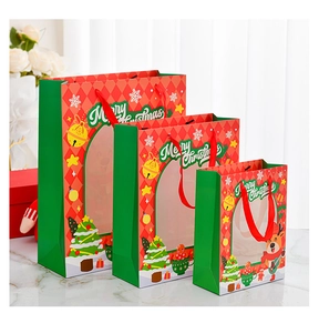 Three sizes of Christmas gift bags with window display and festive reindeer patterns
