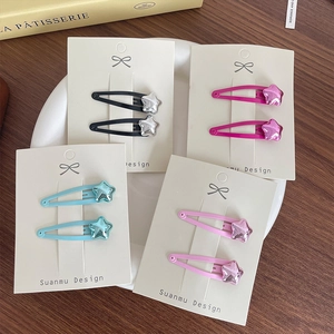 Star-shaped metallic hair clips set for girls featuring colorful five-point star charms