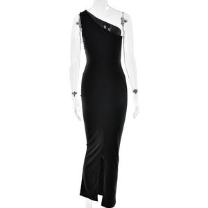 Detail view of black one-shoulder dress showing side slit and ruched bodycon fabric texture