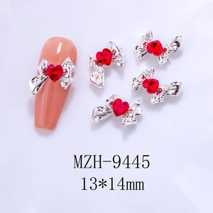 Bowknot nail charm with red heart stone and silver alloy base in 13x14mm size