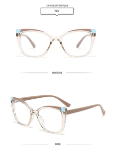 Detail of tea brown cat-eye glasses frame with blue accents and smooth acetate finish