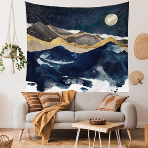 Detail of mountain tapestry showing abstract starry night pattern in living room