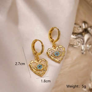 Detailed view of heart-shaped evil eye earrings with gold plating and dimensions