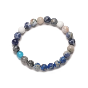 Macro detail of eight planets natural stone bracelet with assorted colorful round beads