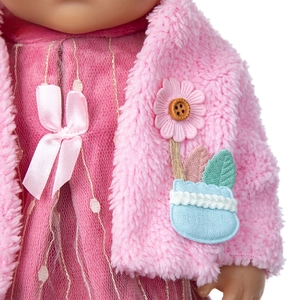 Detail of pink fleece doll jacket with daisy patch and tulle dress for 18 inch dolls