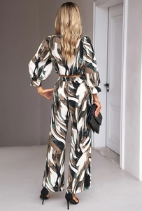 Rear view of long sleeve crop top and high waist wide leg trousers with abstract print