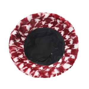 Interior view of warm houndstooth plush bucket hat with soft black fabric lining