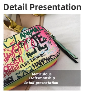 Close-up of rainbow graffiti crossbody bag featuring colorful hand-drawn prints and textures