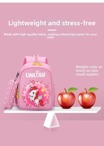 Pink unicorn kids backpack with matching pencil case shown on a scale for lightweight feature