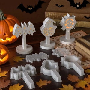 Halloween silicone molds featuring skull, bat and witch hat silhouettes with light base