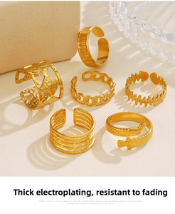 Set of six gold-plated stainless steel geometric rings with chain and fish patterns