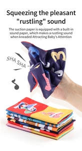 Detail showing built-in sound paper in soft cloth book making rustling sounds for babies