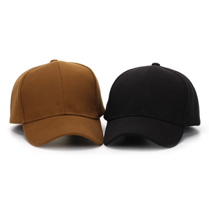 Detailed view of brown and black twill texture baseball caps for autumn and winter