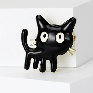 Cute cartoon black cat enamel brooch with gold-plated edges on minimalist white background