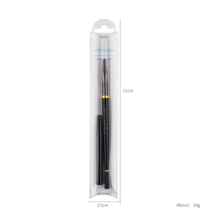 Professional black nail art brush with gold metal ring and protective cap in packaging